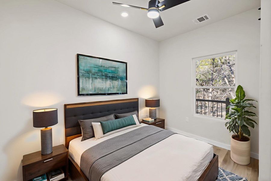 Virtually Staged Bedroom with wood finished floors, a ceiling fan, and recessed lighting Virtually Staged Bedroom with wood finished floors, a ceiling fan, and recessed lighting