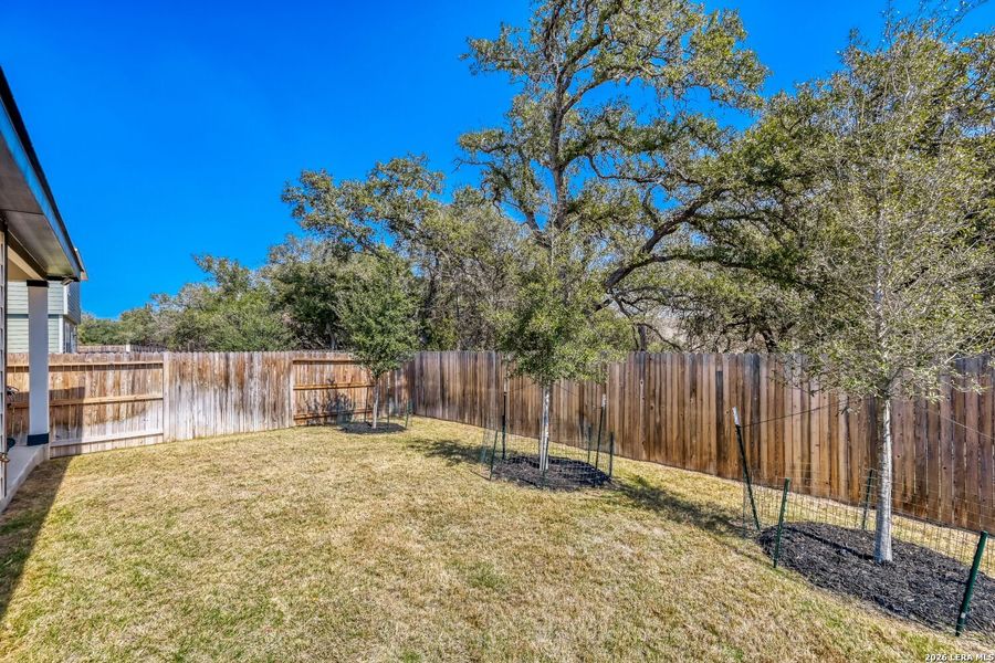 Exterior details and patio area of a home in Timber Creek, San Antonio (Image 21).