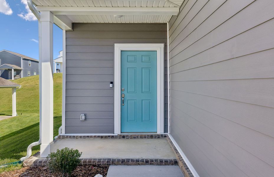 Exterior details and patio area of a home in Independence at Carter's Station, Columbia (Image 20).