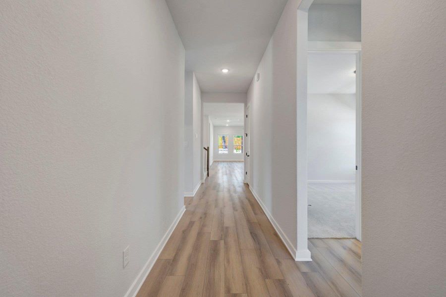 Spacious, unfurnished interior of a new home in Heritage, Dripping Springs (Image 12).