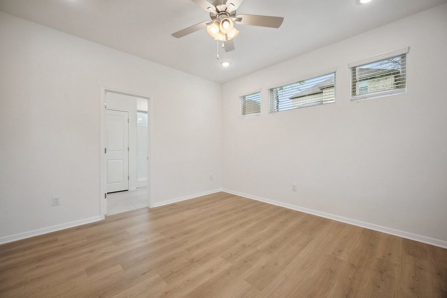 Spacious, unfurnished interior of a new home in The Hills of Bear Creek, Manchaca (Image 17).
