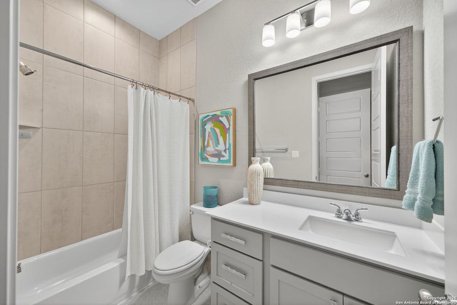 Furnished interior view inside a new home in Cibolo Canyons 60', San Antonio (Image 14).