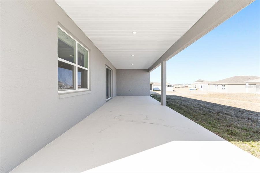 Exterior details and patio area of a home in Calesa Township, Ocala (Image 24).