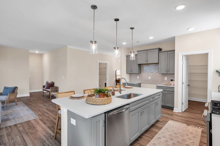Representative furnished interior of a home built from the The Amherst by RobuckHomes in Windwater, Hampstead (Image 41).