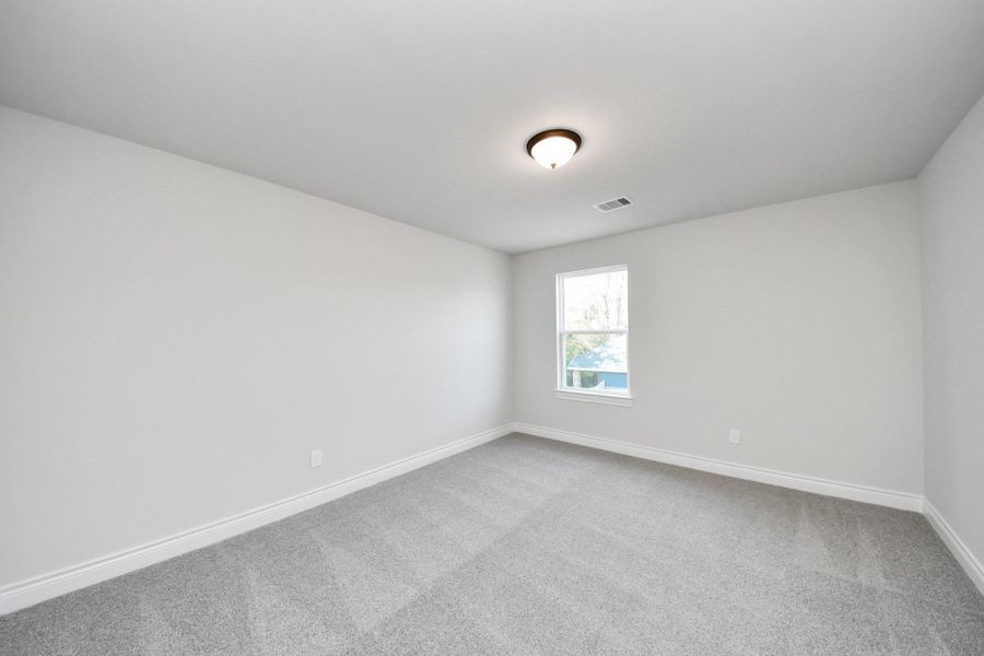 Spacious, unfurnished interior of a new home in Lexington Heights, Willis (Image 38).