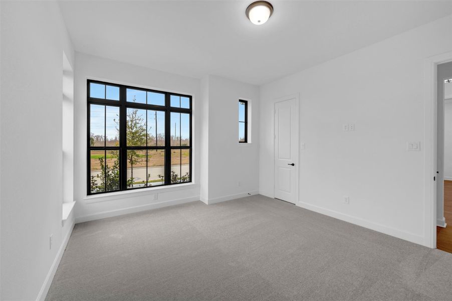 Spacious, unfurnished interior of a new home in Riceland 50’ Alley Load Homesites, Mont Belvieu (Image 26).