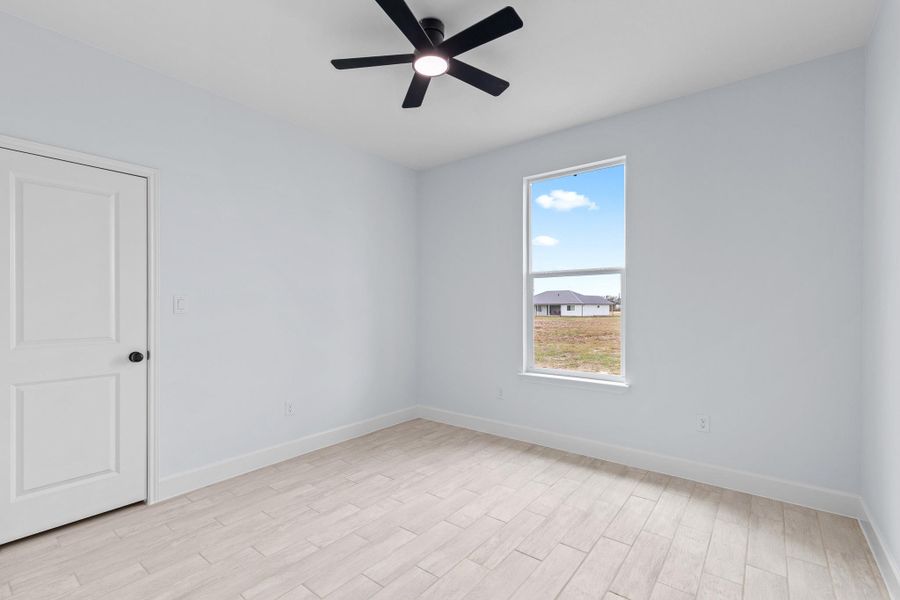 Spacious, unfurnished interior of a new home in , McDade (Image 20).