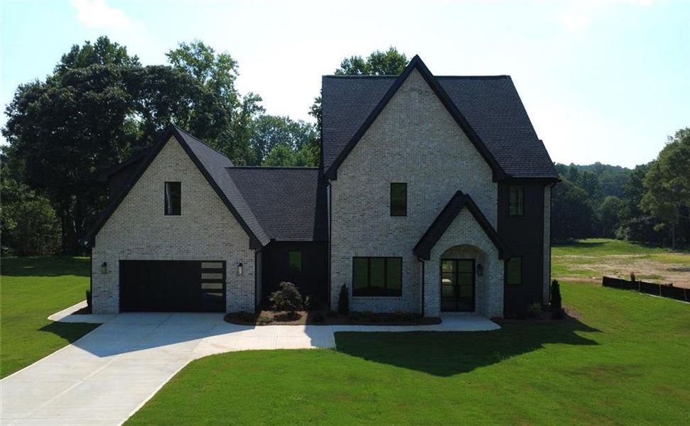 Front exterior of a new home in , Flowery Branch, GA, highlighting curb appeal (Image 26).