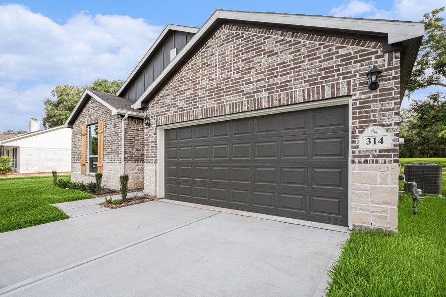 Front exterior of a new home in , Bay City, TX, highlighting curb appeal (Image 2). Front exterior of a new home in , Bay City, TX, highlighting curb appeal (Image 2).