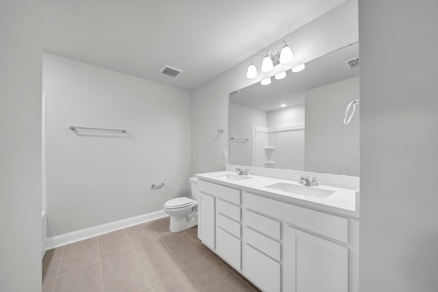 Furnished interior view inside a new home in Monroe Preserve, Chapin (Image 15).