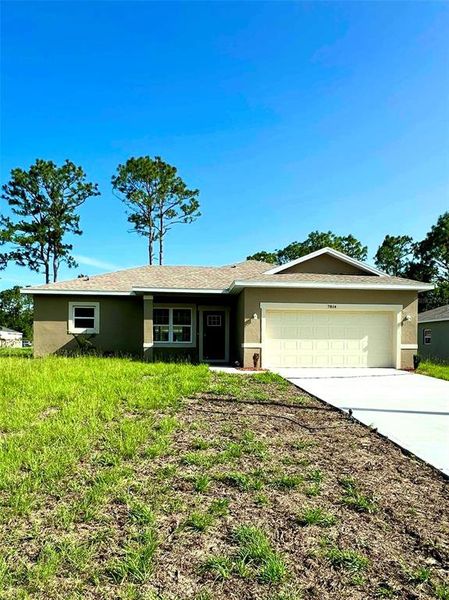 Front exterior of a new home in , Citrus Springs, FL, highlighting curb appeal (Image 2).