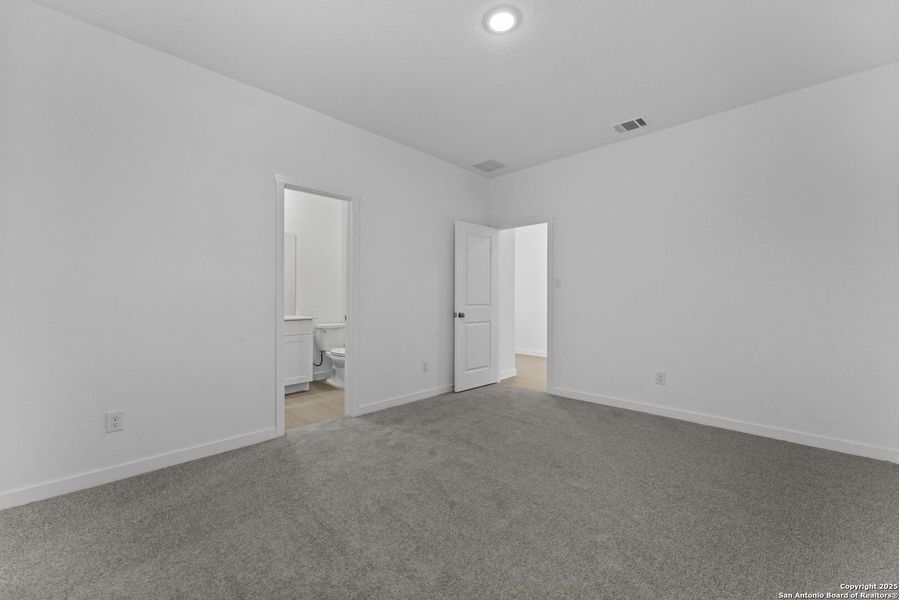 Spacious, unfurnished interior of a new home in Waterwheel: Coastline Collection, San Antonio (Image 24).
