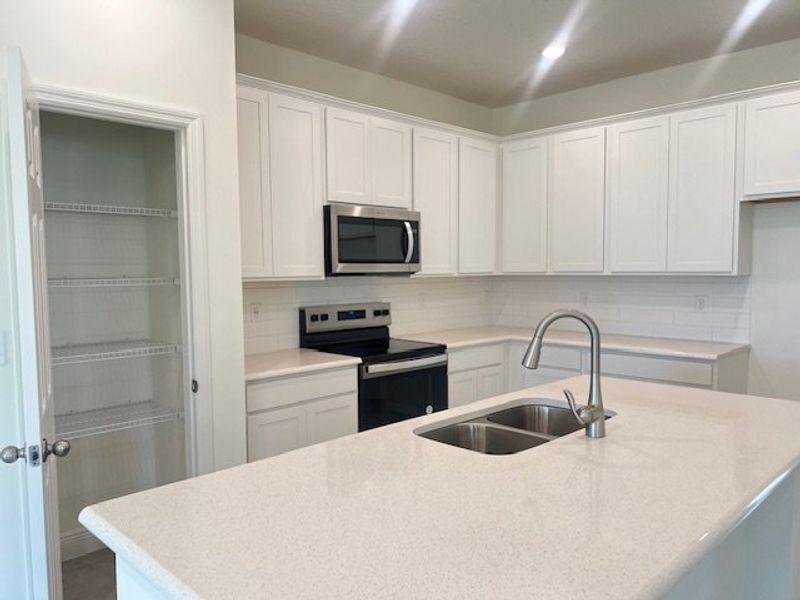 Furnished interior view inside a new home in Lakes At St Sebastian, Micco (Image 11).