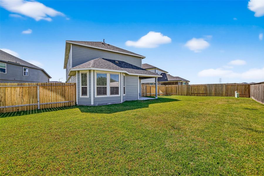 Exterior details and patio area of a home in Anderson Lakes, Houston (Image 3). Exterior details and patio area of a home in Anderson Lakes, Houston (Image 3).
