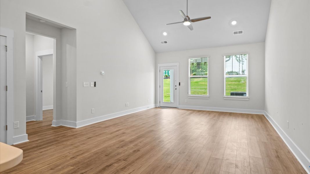 Spacious family room with hardwood flooring in a reputable DRB Homes build at Silo Ridge in Anderson, SC