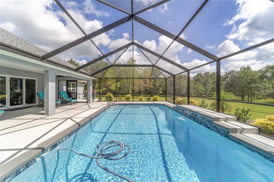 Exterior details and patio area of a home in , Williston (Image 38).
