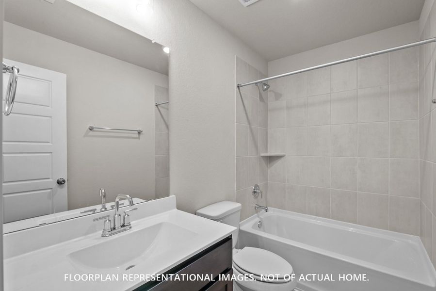 Furnished interior view inside a new home in Sorella, Tomball (Image 9).