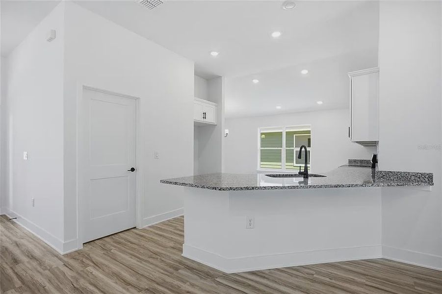 Furnished interior view inside a new home in Briarwood, Alachua (Image 6).