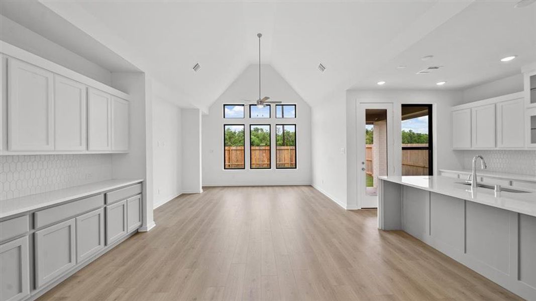 Dining Room with high ceiling