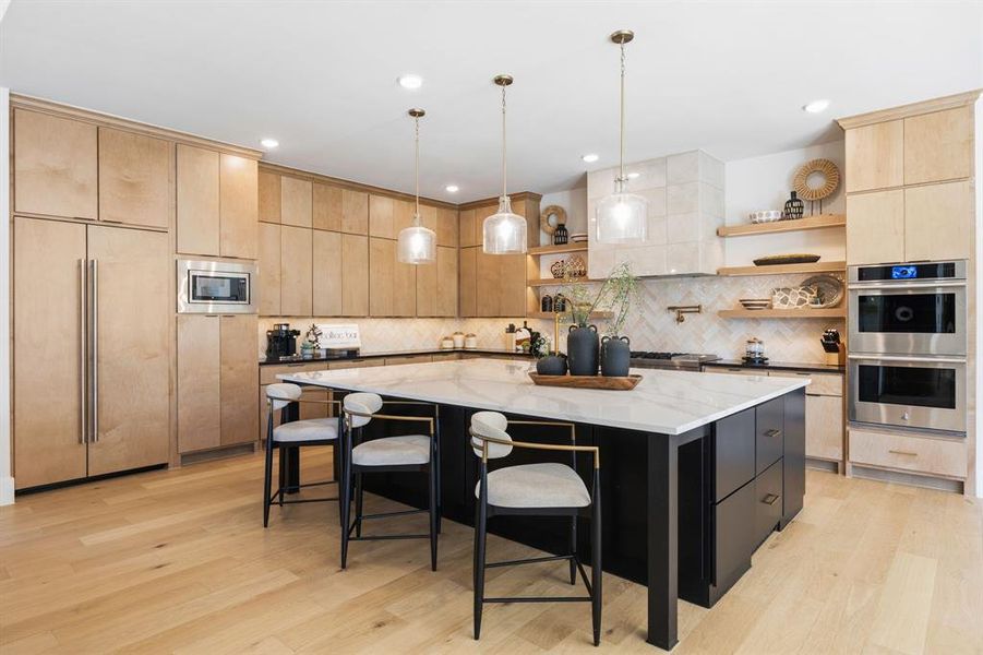 Double ovens and a warming/proofing drawer below! Double ovens and a warming/proofing drawer below!