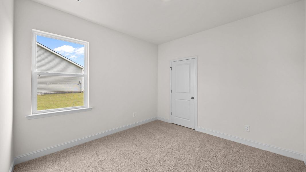Spacious, unfurnished interior of a new home in Beaver Dam Crossing, Bailey (Image 23).