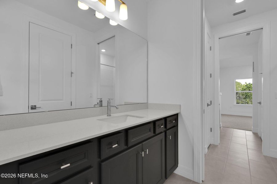Furnished interior view inside a new home in The Landings at Saint Johns, St. Johns (Image 19).
