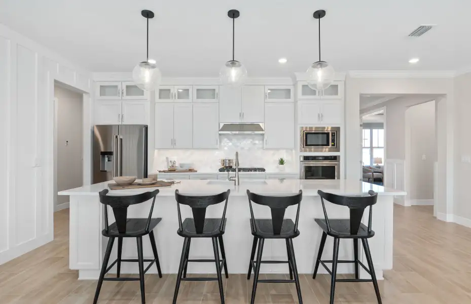 Representative furnished interior of a home built from the Ashby Grand by Pulte Homes in Stonehill, Howey-in-the-Hills (Image 9).