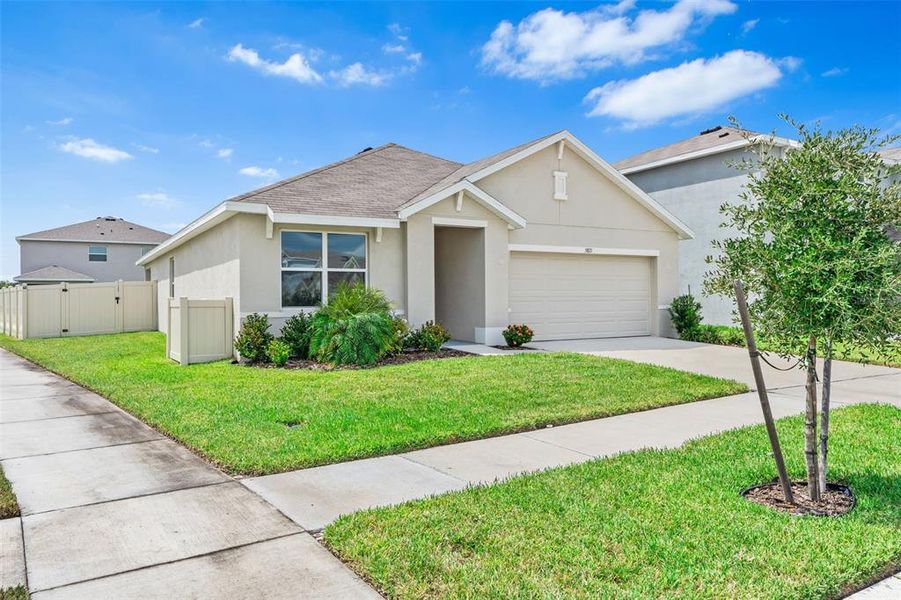 Front exterior of a new home in , Wesley Chapel, FL, highlighting curb appeal (Image 18).