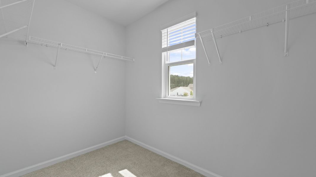Representative unfurnished interior of a home built from the DUNCAN by D.R. Horton in Carolina Groves Townhomes, Moncks Corner (Image 19).