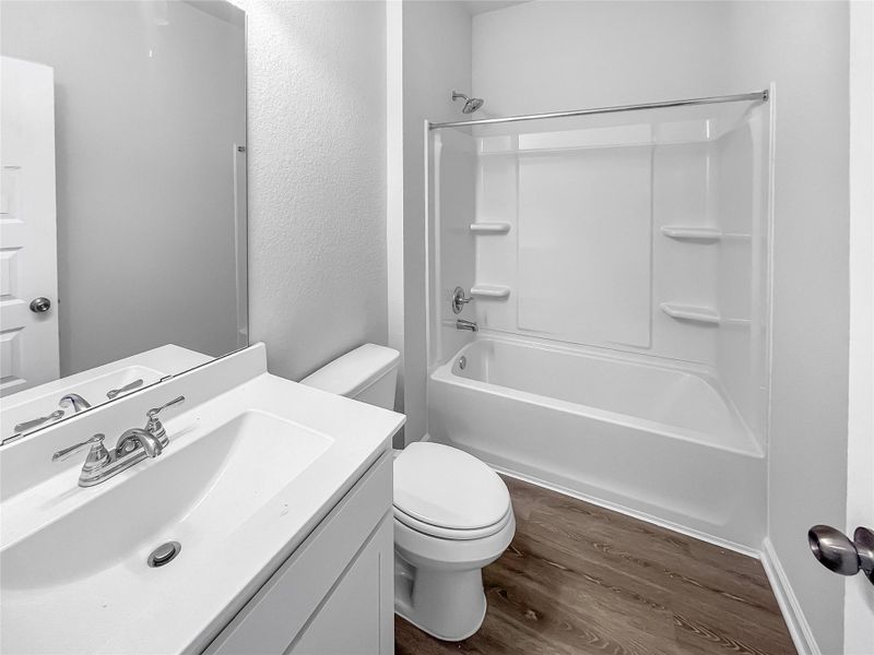 Furnished interior view inside a new home in Sierra Vista, Iowa Colony (Image 3).