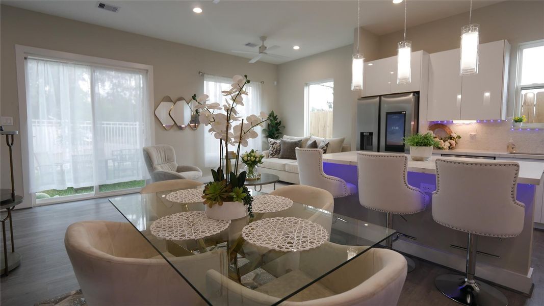 Staged Living/Common area with open concept kitchen. Not actual unit. Staged Living/Common area with open concept kitchen. Not actual unit.