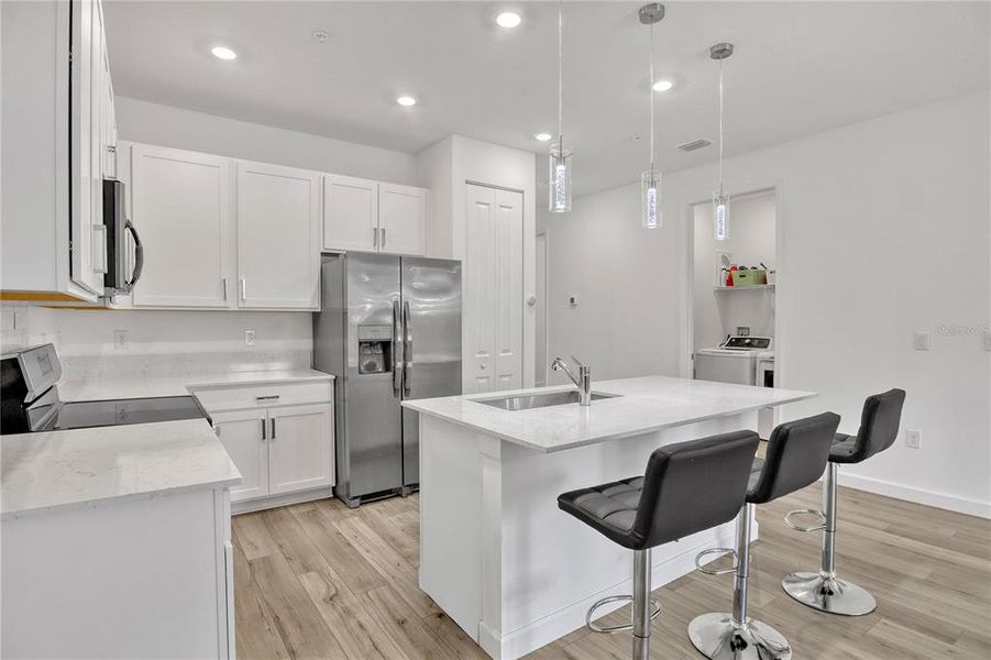 Furnished interior view inside a new home in The Timbers at Everlands, Palm Bay (Image 16).