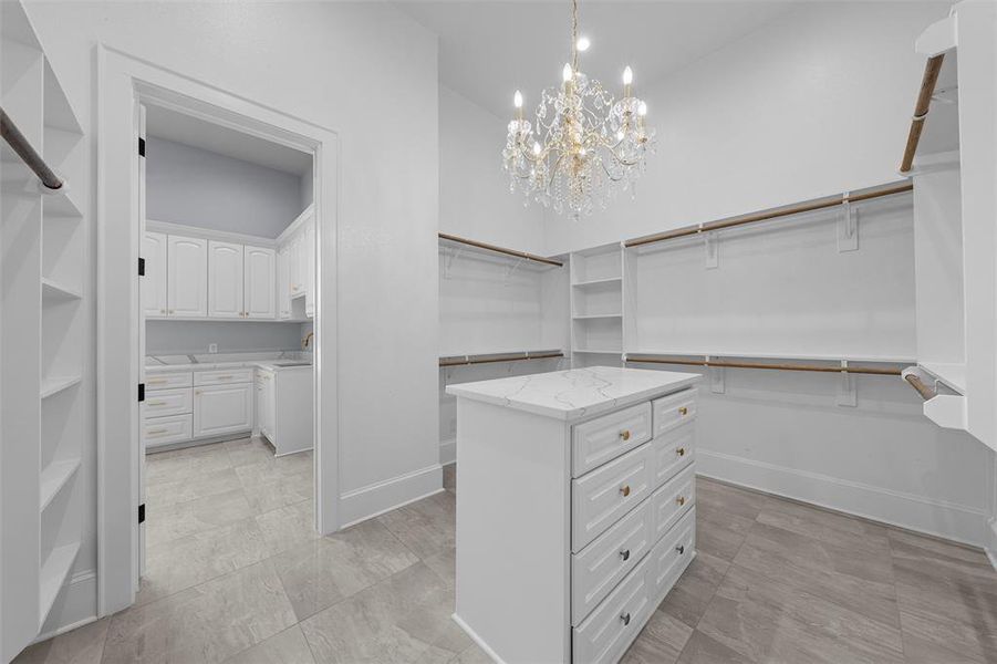 Walk in closet with a chandelier Walk in closet with a chandelier