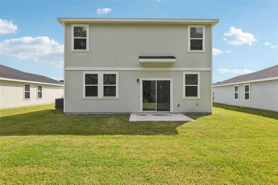 Exterior details and patio area of a home in Flagler Village - Classic Series, Palm Coast (Image 21). Exterior details and patio area of a home in Flagler Village - Classic Series, Palm Coast (Image 21).