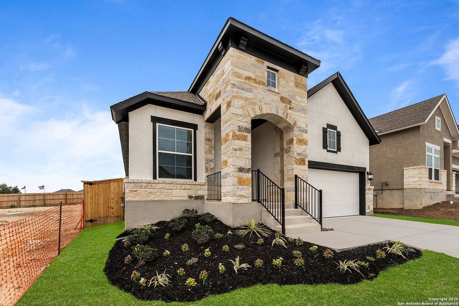 Front exterior of a new home in Ladera - High Point 45', San Antonio, TX, highlighting curb appeal (Image 1).