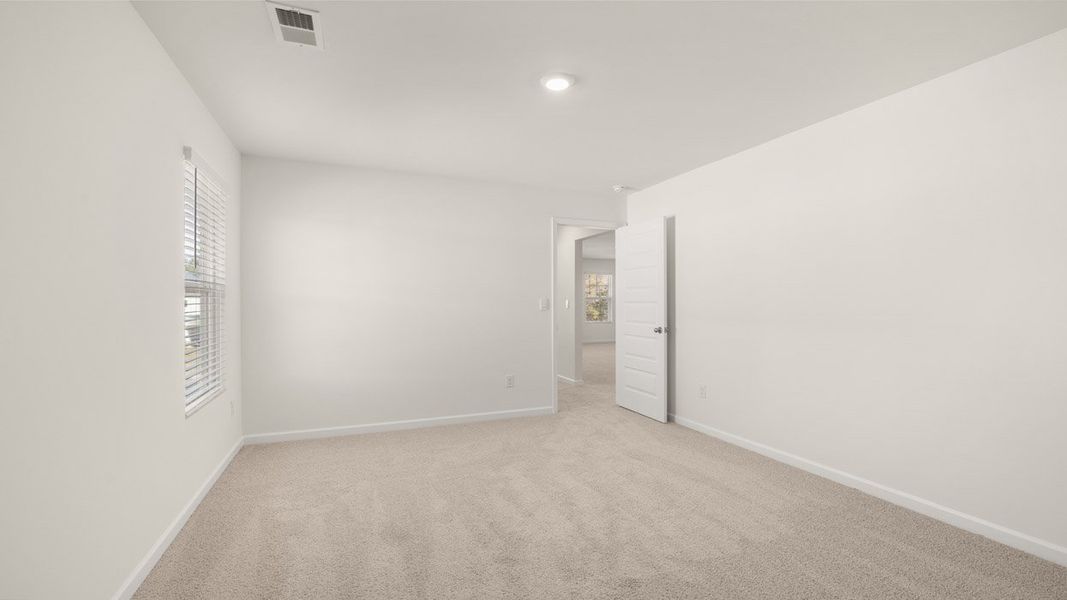 Representative unfurnished interior of a home built from the Mansfield by D.R. Horton in Brooks Station, Dacula (Image 29).