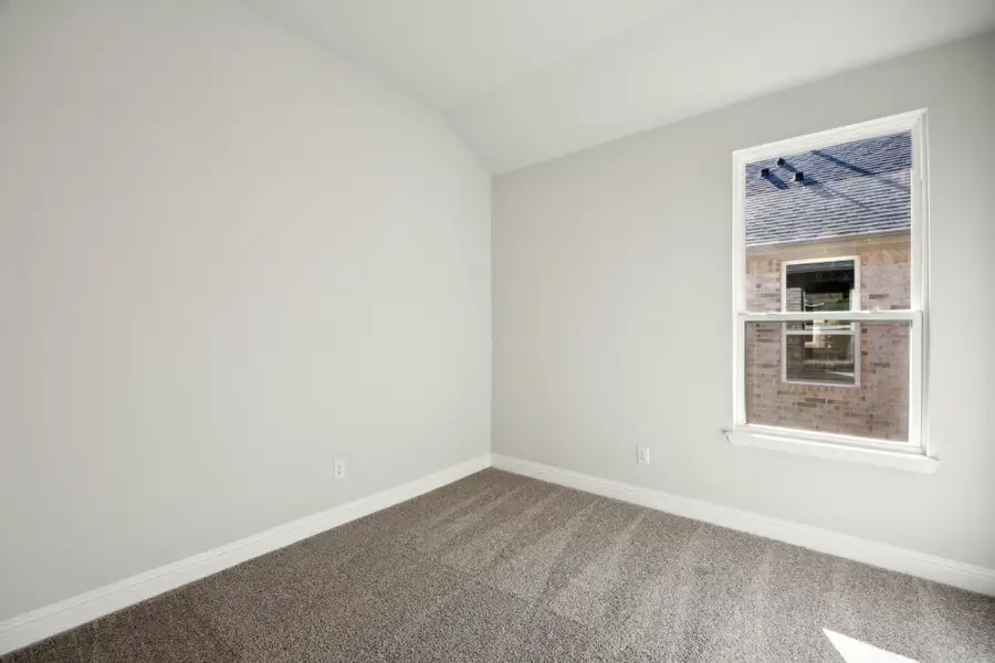Representative unfurnished interior of a home built from the Waverly III by Megatel Homes in Bellagio, Forney (Image 14).