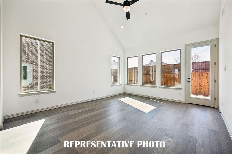 You'll enjoy a spacious family room flooded with natural light in our Walker floor plan.  REPRESENTATIVE PHOTO