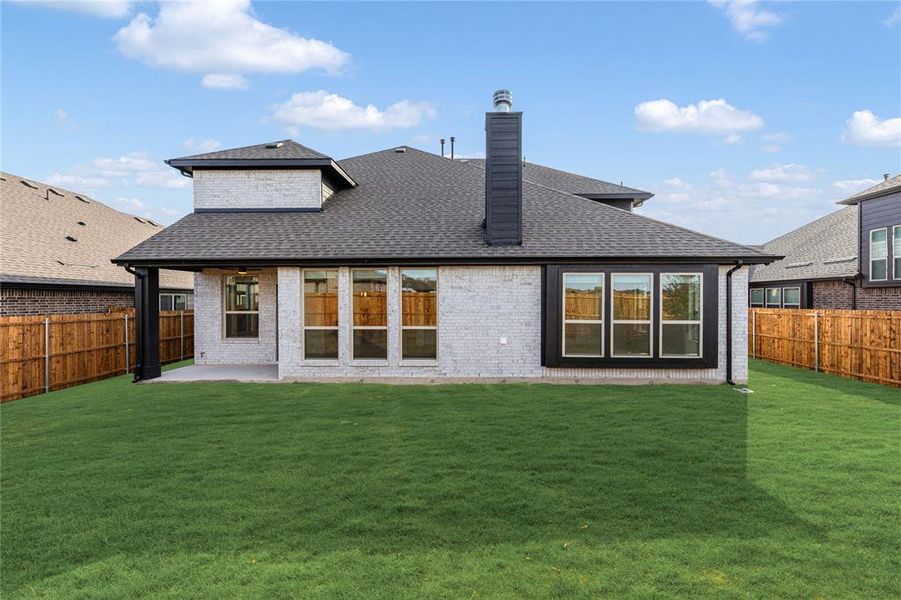 Exterior details and patio area of a home in West Crossing, Anna (Image 4). Exterior details and patio area of a home in West Crossing, Anna (Image 4).