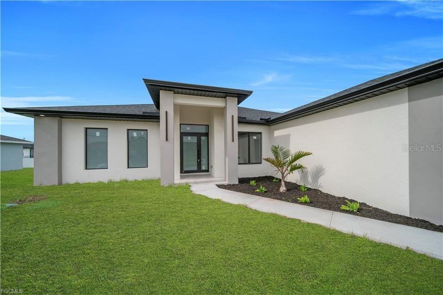 Exterior details and patio area of a home in , Lehigh Acres (Image 3). Exterior details and patio area of a home in , Lehigh Acres (Image 3).