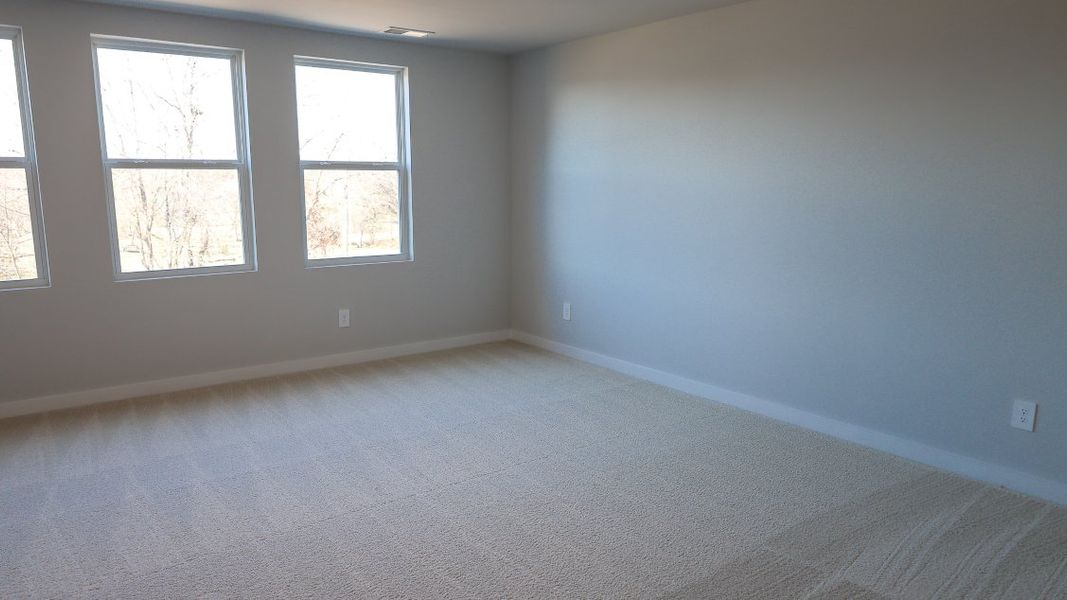 Representative unfurnished interior of a home built from the TISDALE by D.R. Horton in Harvest Point, Spring Hill (Image 56).