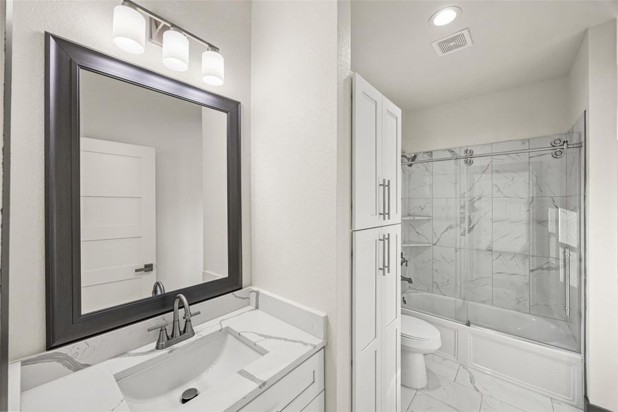 Furnished interior view inside a new home in , Conroe (Image 8).