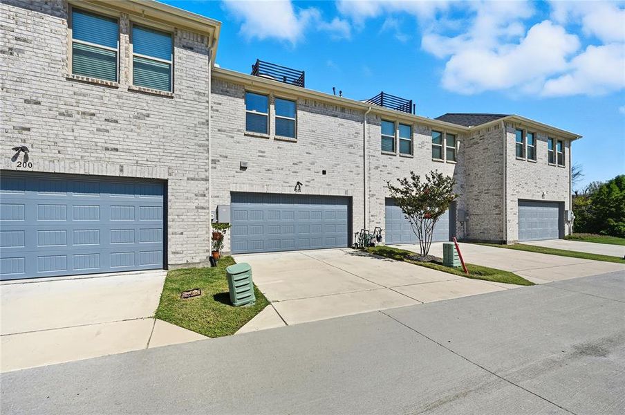 Exterior details and patio area of a home in , Flower Mound (Image 22).