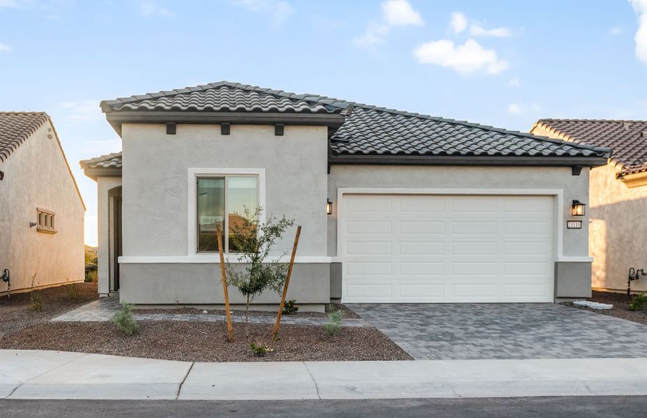 Front exterior of a new home in Sun City Festival, Buckeye, AZ, highlighting curb appeal (Image 1). Front exterior of a new home in Sun City Festival, Buckeye, AZ, highlighting curb appeal (Image 1).