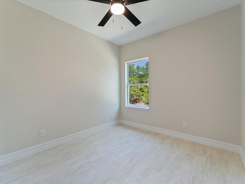 Spacious, unfurnished interior of a new home in , Port Charlotte (Image 12).