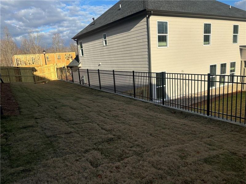 Exterior details and patio area of a home in , Buford (Image 32). Exterior details and patio area of a home in , Buford (Image 32).