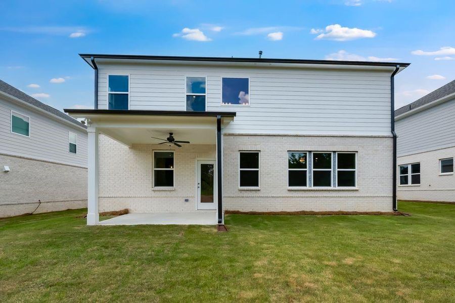 Front exterior of a new home in Bennett Farm, Loganville, GA, highlighting curb appeal (Image 2).