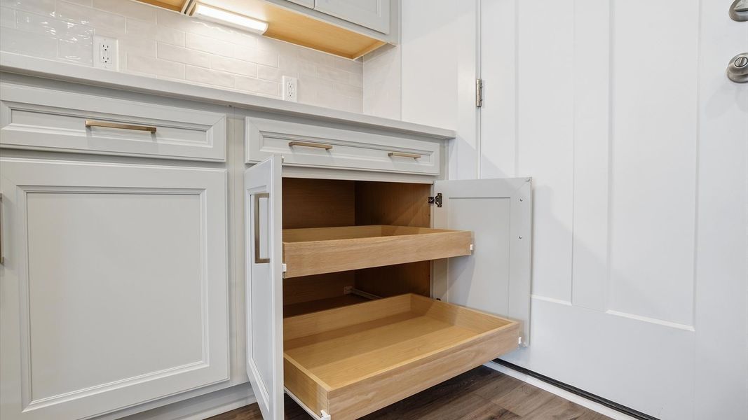 Superior kitchen with sleek cabinetry, abundant storage, and modern finishes located near Lake Hartwell Superior kitchen with sleek cabinetry, abundant storage, and modern finishes located near Lake Hartwell