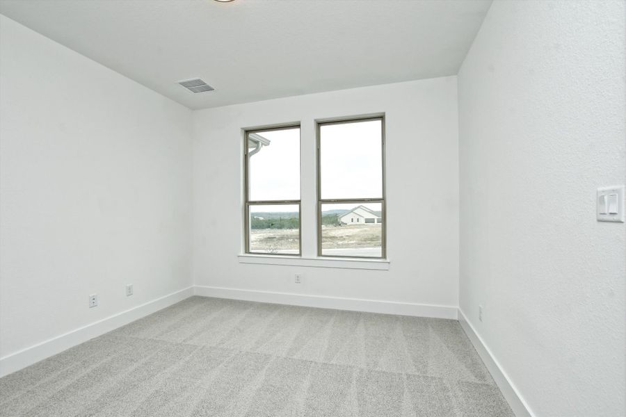 Representative unfurnished interior of a home built from the Madera II by Giddens Homes in Scofield Farms Estates, Georgetown (Image 451).