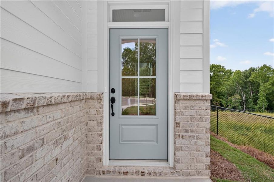 Exterior details and patio area of a home in Villas at Dawsonville, Dawsonville (Image 28).